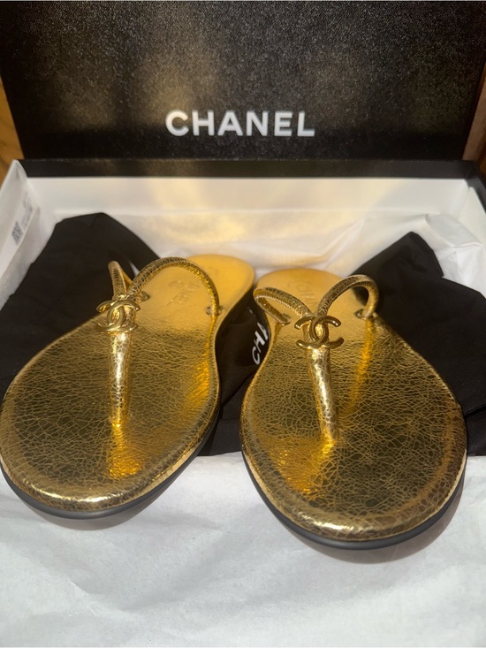 CHANEL Shoes - CHANEL Metallic Gold CC Logo Thong Sandals